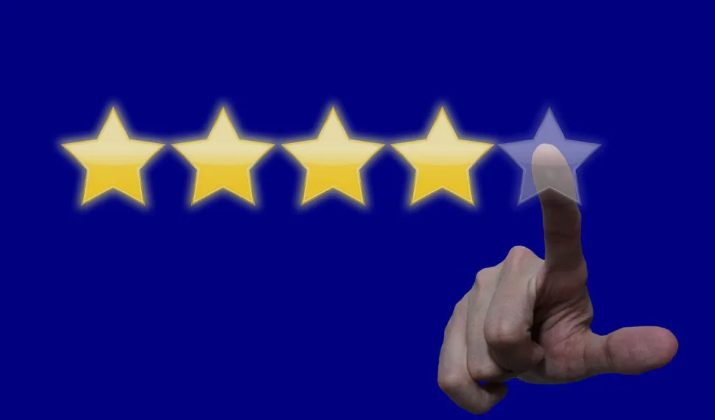 Five-star rating and customer reviews on a mobile screen